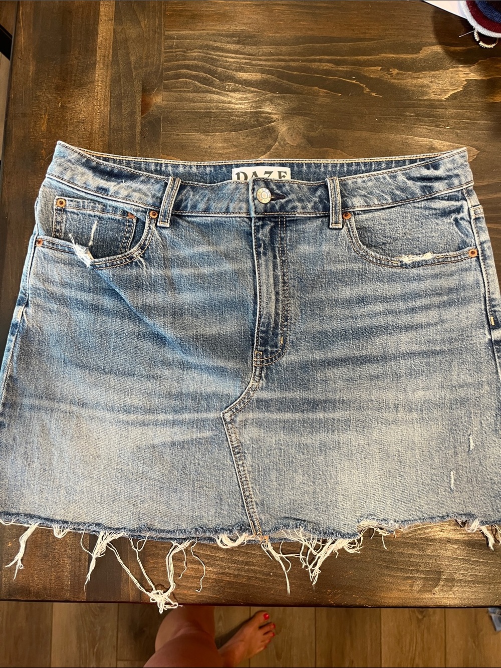 Women's Light Blue Distressed Denim Mini Skirt